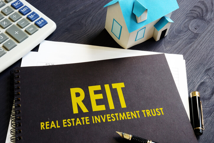 Notebook entitled REIT: Real Estate Investment Trust